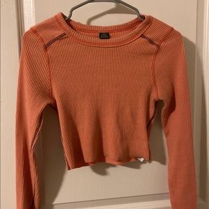 Orange long sleeve crop top